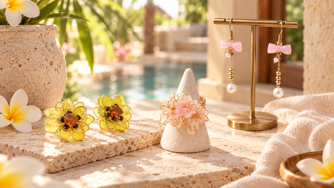 Handmade floral jewelry arranged as a feminine birthday gift on ivory linen